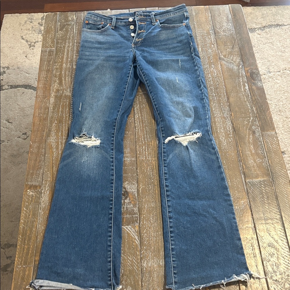 Distressed Blue Jeans